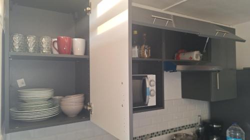 Kitchen, Chambre Carnaval Abymes Guadeloupe in Les Abymes