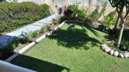 สวน, T2 Bas de villa Les Hibiscus in บัว โฌลอง