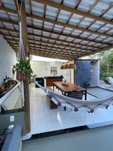 Casa Ecológica 7 - Condomínio localizado a 2km das Praias, com 3 quartos equipados com ar-condicionado, Piscina e Área Gourmet