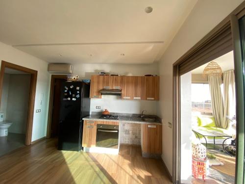 Sidi rahal blue beach Cozy apartment with a sea view in Sidi Rahal