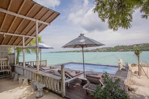 Swimming pool, Wooden Beach Sunset Cottages near Two Raksa Cafe