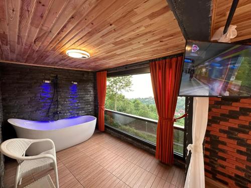 صالة مشتركة/ منطقة التلفزيون, Bungalow in هوبا