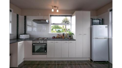 3-bedroom 2-bathroom Bright & Sunny Family home, Auckland (fotografie 2)