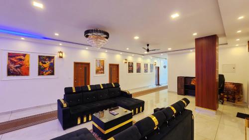 salon détente/TV commun, The Sky Hotel Coorg in Coorg