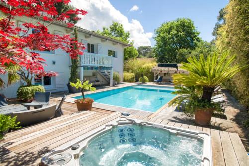 Superbe villa de plage avec piscine chauffée et jacuzzi proche des plages - Location, gîte - La Teste-de-Buch