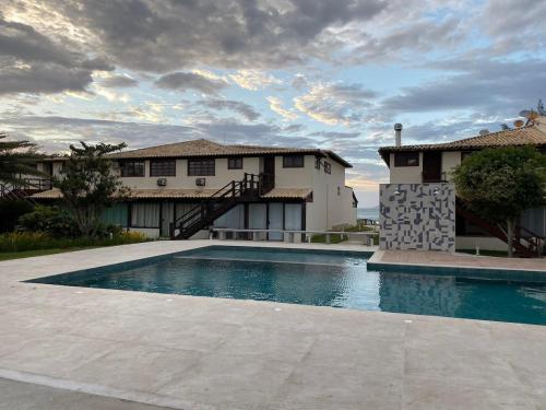 مسبح, Casa Espetacular na areia da Praia de Geribá (Casa Espetacular na areia da Praia de Geriba) in Geriba Lake