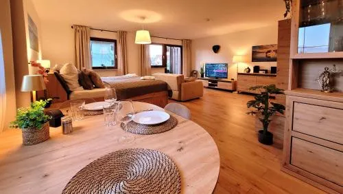 MADISON Homes Apartment 50 qm in Prien mit Balkon, Bergblick, Parkplatz, zentral gelegen in Prien am Chiemsee, Deutschland
