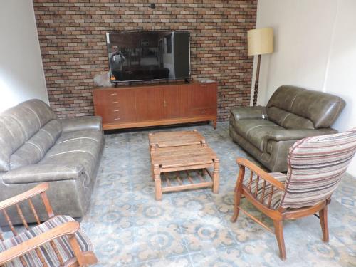Közös társalgó / TV, Hotel CENTRAL 33 in Treinta y Tres