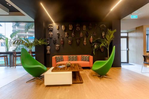 Shared lounge/TV area, Seen Hotel Abidjan Plateau in Abidjan