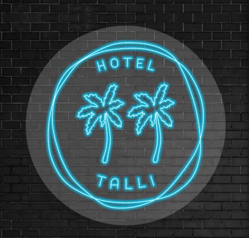 Talli Hotel - Tap to explore photos
