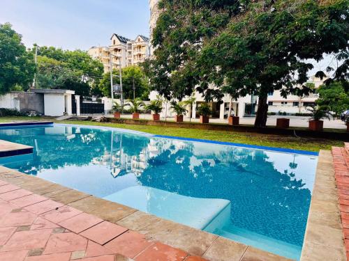 Bể bơi, Dee Kijanis studio apartment in Mombasa