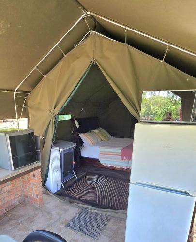 Riverbend Camp - Self-catering Luxury Glamping Tent in Kristiana