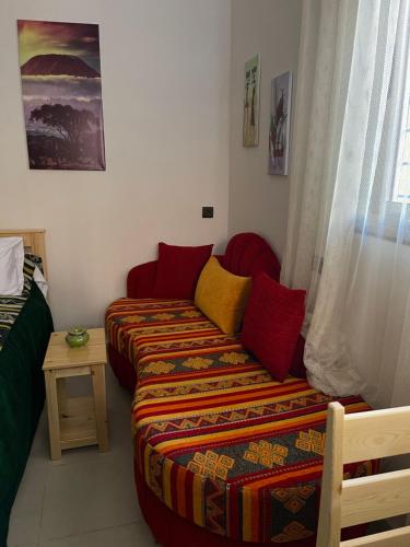 Chambre triple, vue sur le jardin