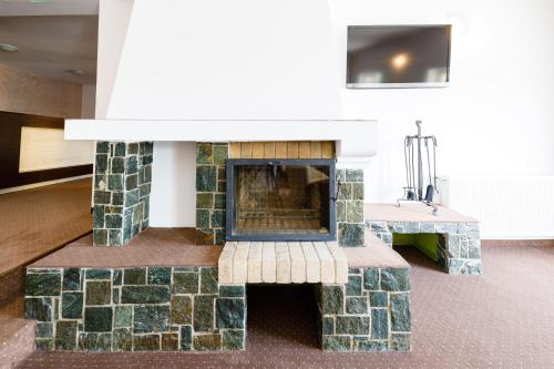 Koplietošanas atpūtas telpa ar TV, Pensiunea Petra- Clisura Dunarii Resort & SPA in Divici