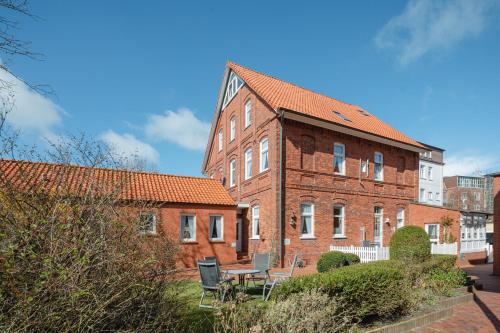 Сад, Villa Altmanns Wohnung Wiebke in Юйст