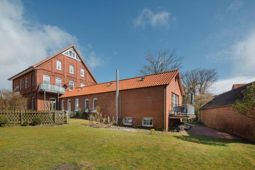 Сад, Villa Altmanns Wohnung Wiebke in Юйст