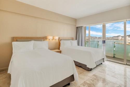 Deluxe Room, 2 Double room in Fiesta Americana Acapulco Villas