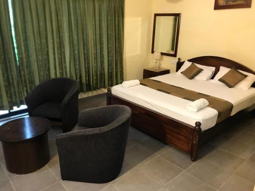 Deluxe Double Room with Balcony room in the Brookside Nature Resort