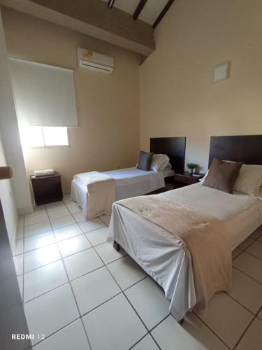 1 double bed, 2 twin beds