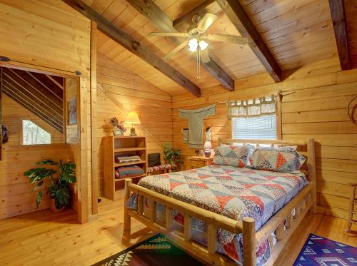 MEDICINE MAN is a COZY log cabin with hot tub mountain view and pool table!