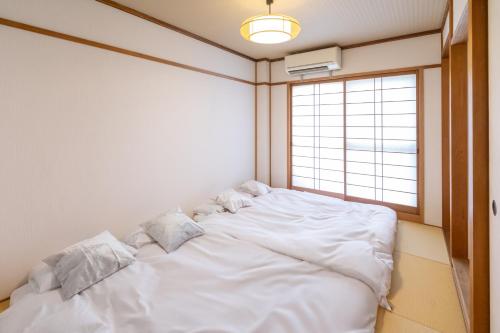 住舎高見, Osaka