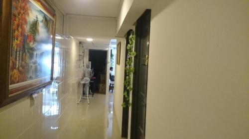 Shared lounge/TV area, Hotel Axis in Taiping