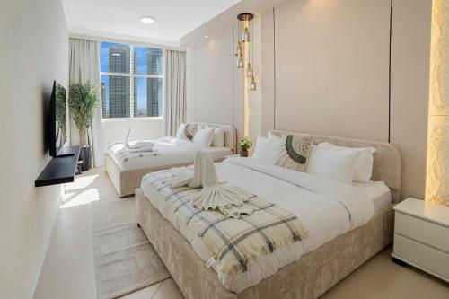 13 - Stylish Dorra Bay Family Apartment - Canal View & Pool Access, Dubaï