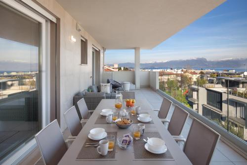 Two-Bedroom Apartment with Balcony room in Perla Garda Lake Apartment With Pool