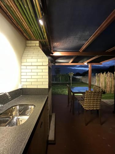 Iekārtas, Casa Amendoeira - Rua da Praia Grande - Laguna-SC in Farol de Santa Marta