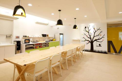 Kitchen, Ease Single Inn in Taichung