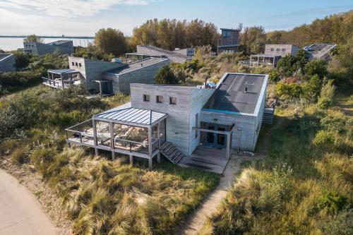  Villa 25 – Wild & Wood | Am Strand mit Blick auf das Wasser in Ouddorp