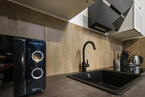 Cocina, Boardinghaus Grünefeld W5 I by Wooon I P I Küche I Smart TV (Boardinghaus Grunefeld W5 I by Wooon I P I Kuche I Smart TV) in Mettingen