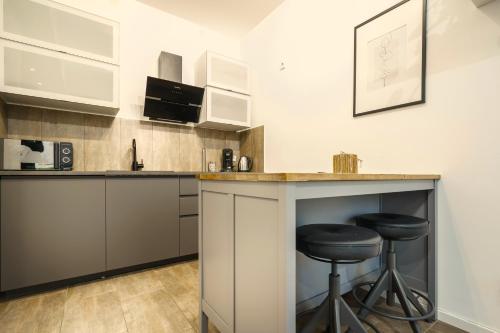 Cocina, Boardinghaus Grünefeld W5 I by Wooon I P I Küche I Smart TV (Boardinghaus Grunefeld W5 I by Wooon I P I Kuche I Smart TV) in Mettingen