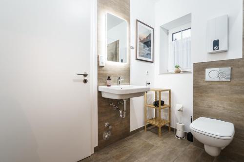 Baño, Boardinghaus Grünefeld W5 I by Wooon I P I Küche I Smart TV (Boardinghaus Grunefeld W5 I by Wooon I P I Kuche I Smart TV) in Mettingen