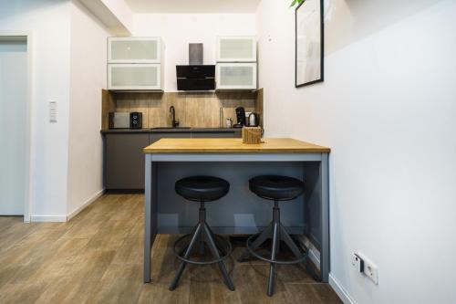 Cocina, Boardinghaus Grünefeld W5 I by Wooon I P I Küche I Smart TV (Boardinghaus Grunefeld W5 I by Wooon I P I Kuche I Smart TV) in Mettingen