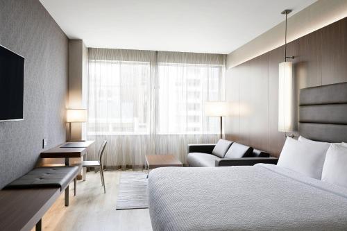 King Guest Room with Sofa Bed room in AC Hotel Dallas Downtown