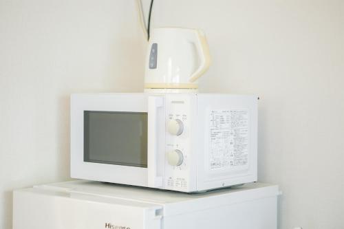 Kitchen, アパートメントホテル名古屋高畑 in Nakagawa