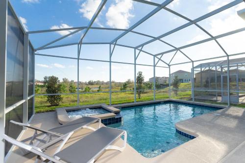 Gorgeous 6 Bd SF Close to Disney w  Pool   Champions Gate Resort 712