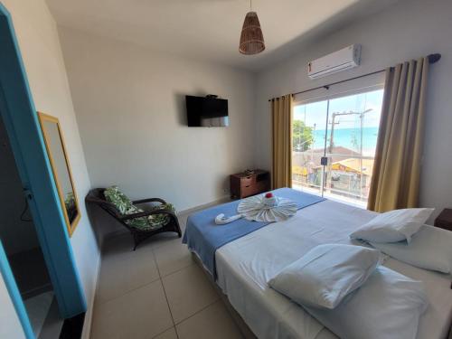Double Room with Balcony and Sea View room in Pousada Tartaruga