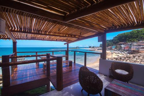 ระเบียง/ชานเรือน, One Beach Boutique Hotel in มอร์โร เดอซาโอ พอโล