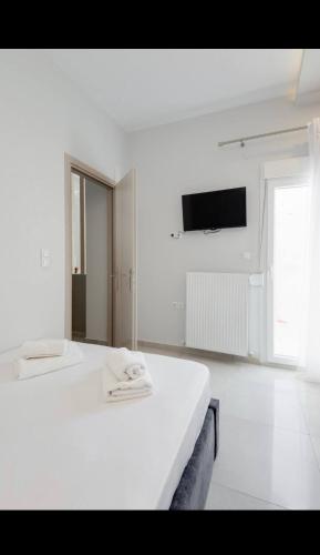 Center at Al Svolou str -50 sqm - 3 p - 2 balconies -2 Tvs - Optical fiber - Washine machine - Fully equipped kitchen - 8th floor, Soluň (fotografie 7)