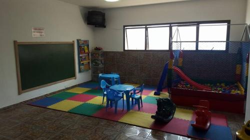 Kid’s club, Apartamento Temporada Guaruja Four Seasons in Morro do Maluf
