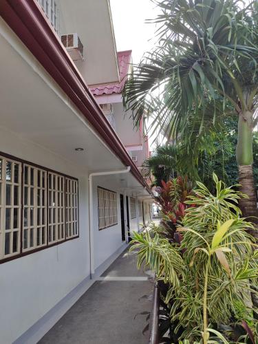 Exterior view, Castle Rock Apartelle near Punta Bunga Beach