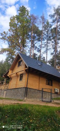 Dadaj Chill Wilimy domek sauna, balia jakuzzi, fotel masujący, plaża (Dadaj Chill Wilimy domek sauna, balia jakuzzi, fotel masujacy, plaza) in Віліми