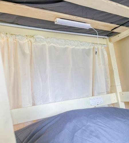 Bed and Pool in Hostel Apartment Avida Towers Cebu IT Park, Cebu (photo 6)