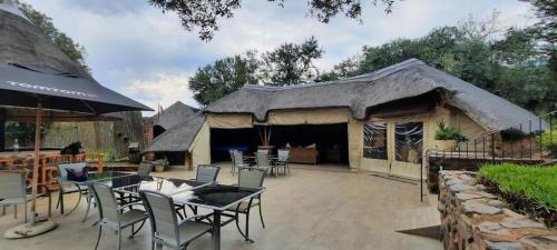 Pub/Lounge, Tidimalo Lodge in Maanhaarand