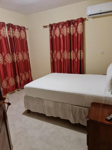 Paradise place grande hotel rooms in Discovery Bay