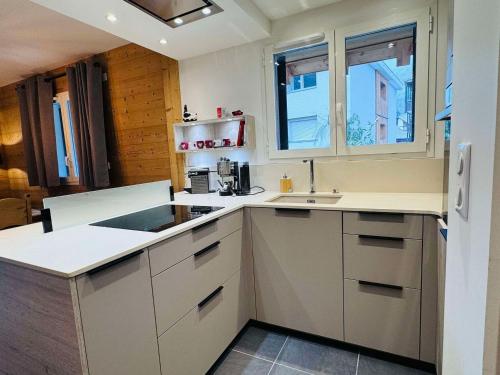 Appartement moderne 4 pièces proche des remontées parking inclus - FR-1-546-58 - image 5