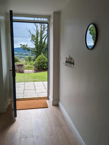 Unwind at Hilltop Farm Cottage with Valley Views in Cappoquin