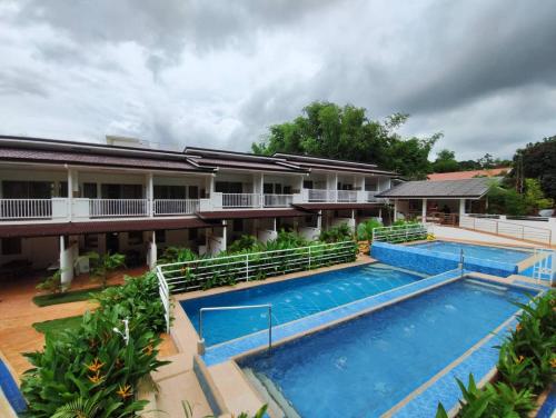Swimming pool, DMC Condotel near Palawan Butterfly Ecological Garden and Tribal Village